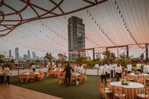 A set-up event venue with tables and chairs, representative of the event-hosting businesses LeadRise serves